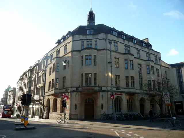 This image consists of a building in the middle. It has windows and doors. There is sky at the top....