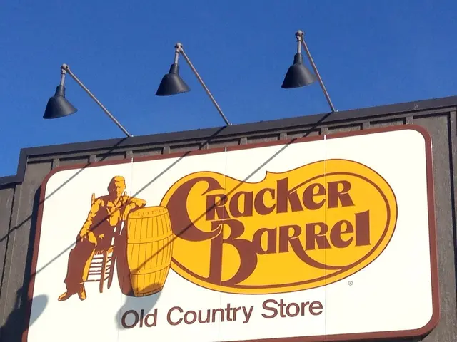 In this picture, we can see the wall, poster with some text and some images on it, we can see...